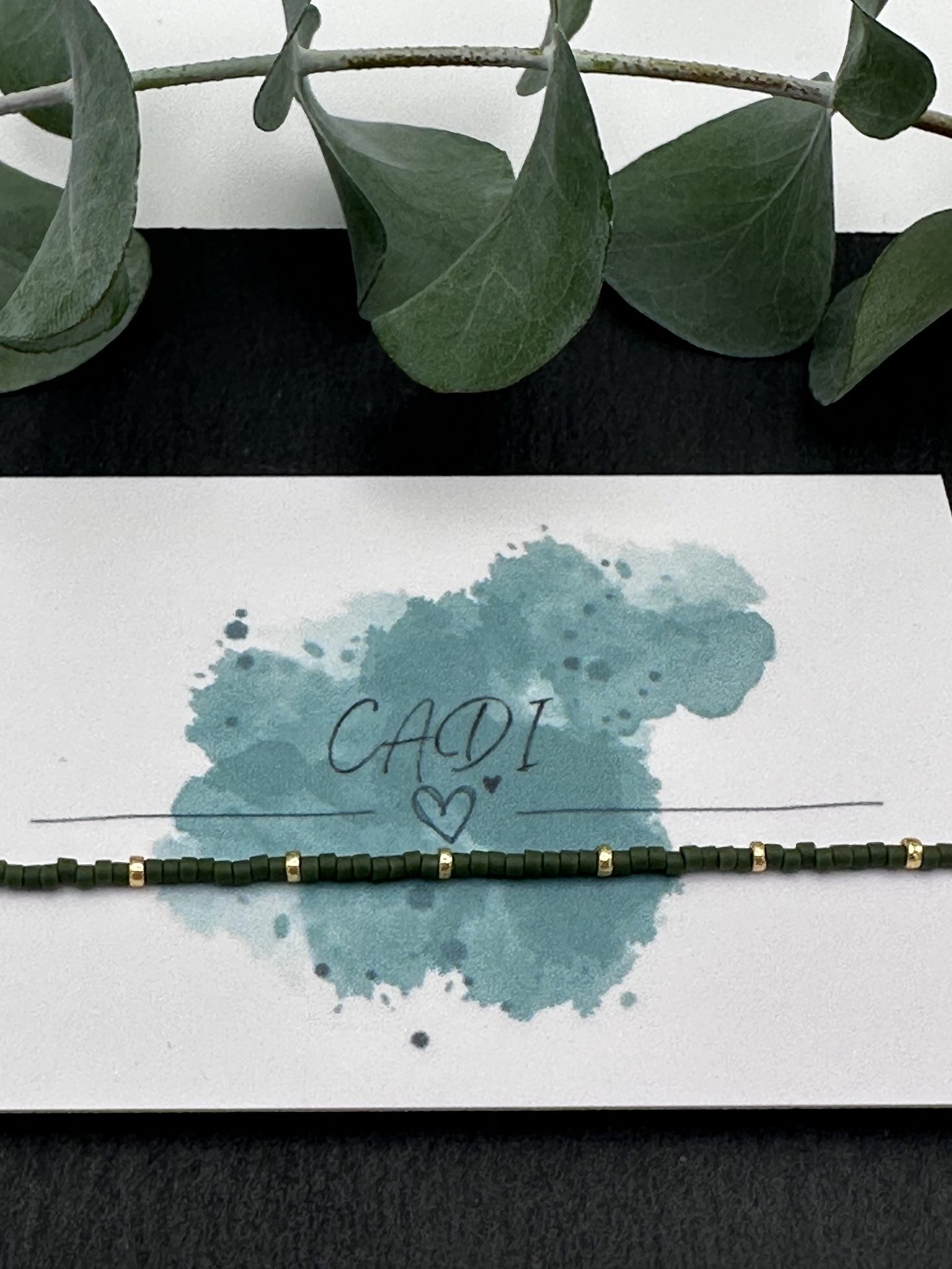 Armband Cadi Miyuki Spacer gold dunkelgrün, Handarbeit aus Klagenfurt, Everglow Spacer