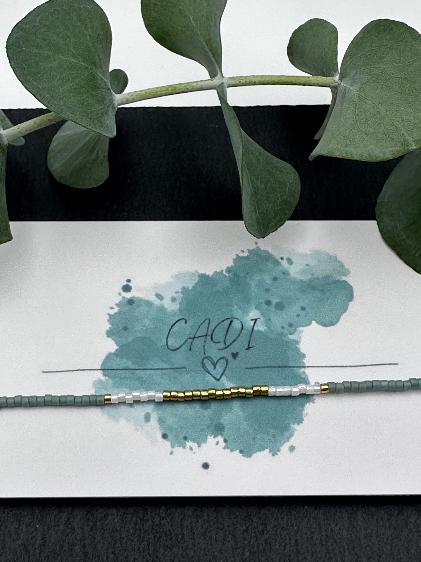 Armband Cadi Miyuki gold tuerkisblau weiss, handgemacht in Klagenfurt