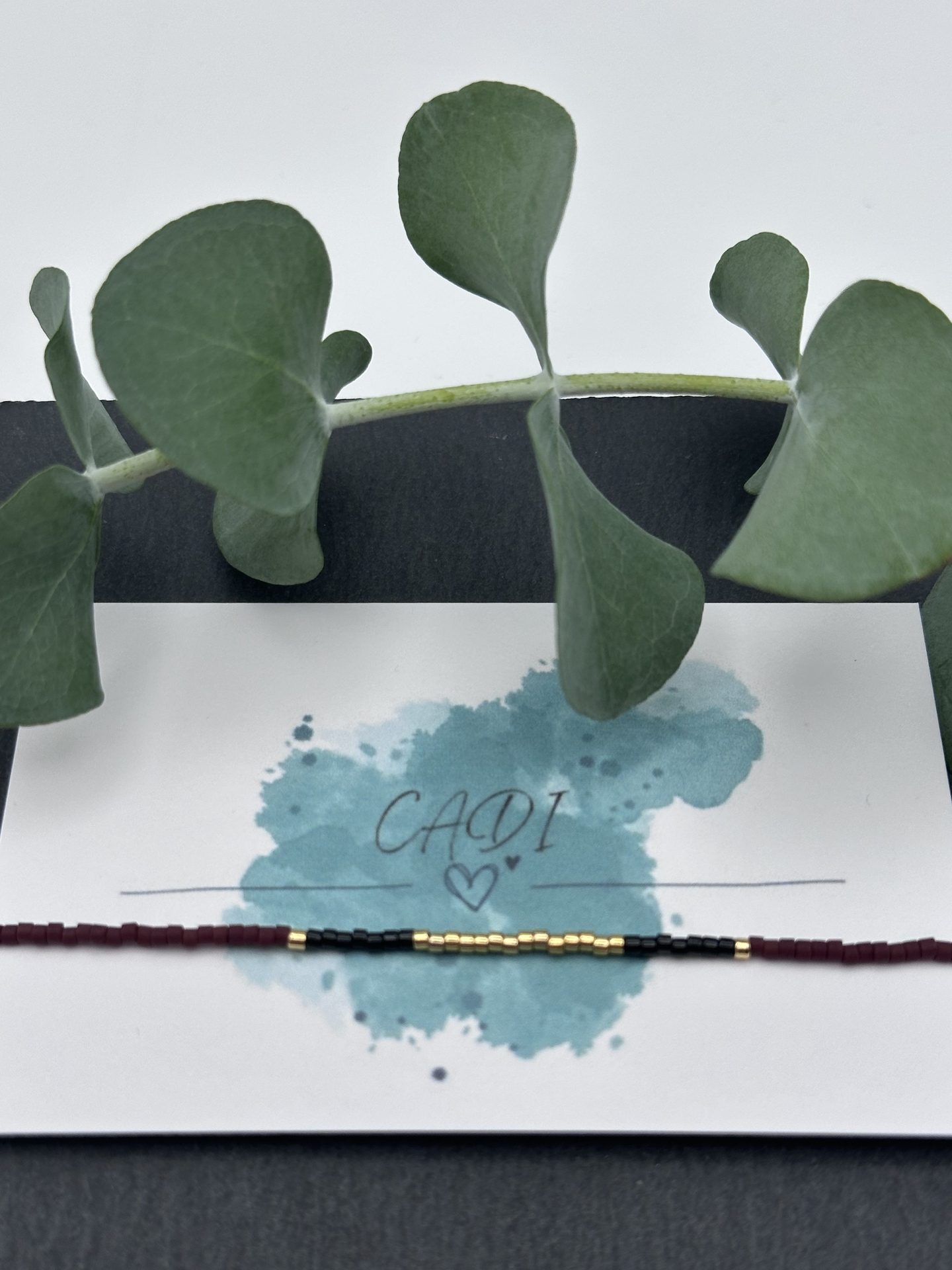 Armband Cadi Miyuki gold weinrot schwarz, handgemacht in Klagenfurt