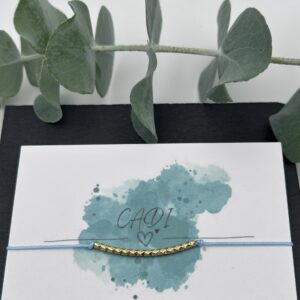 Handgemachtes Nylonarmband mit goldenem Edelstahl Tube.